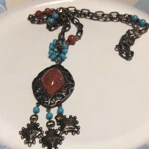 28” necklace with turquoise and brown beads and 3“ pendant